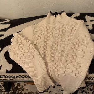 BCBGMaxAzria Cream Turtleneck Sweater with Pom Pom Details